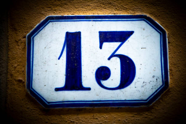 istock Close-Up Of Number 13 On stone wall 1183054865