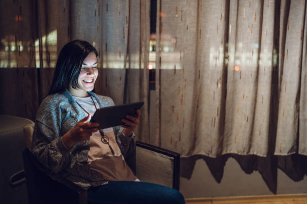 istock Chatting from a hotel room 1183055035