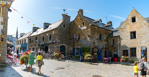 Le Conquet, Finistere / France - 22. August, 2019: view of the busy town square in La Conquet with many tourists visiting