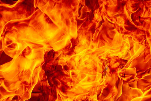 istock Flames and black smoke natural texture 1183062410