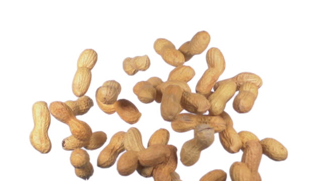 peanuts flying in slow motion