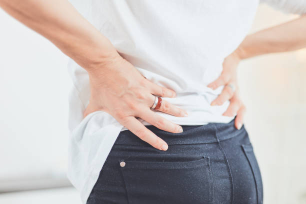 istock Hip, back and spinal problems in adult ages. 1183064170