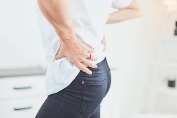 istock Hip, back and spinal problems in adult ages. 1183064269