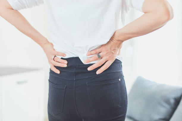 istock Hip, back and spinal problems in adult ages. 1183064624