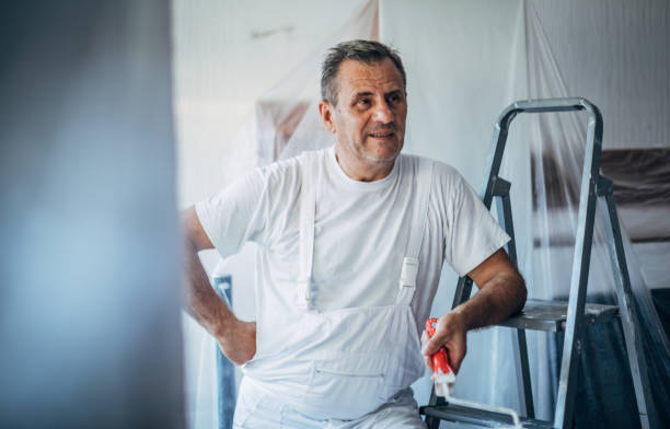 istock Painter in the livingroom 1183065975