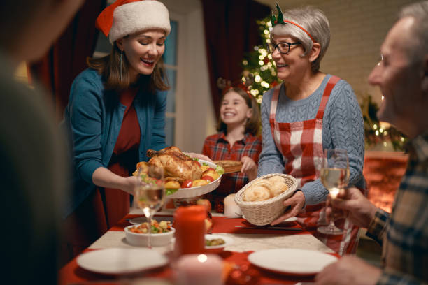 istock family celebrating Christmas 1183066668