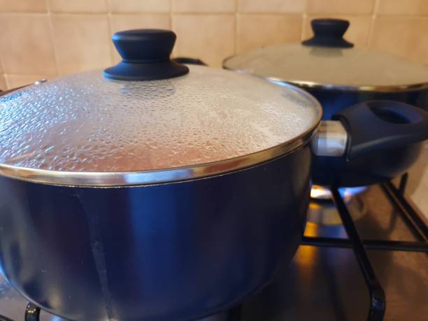 istock Two pots on gas hob 1183068245