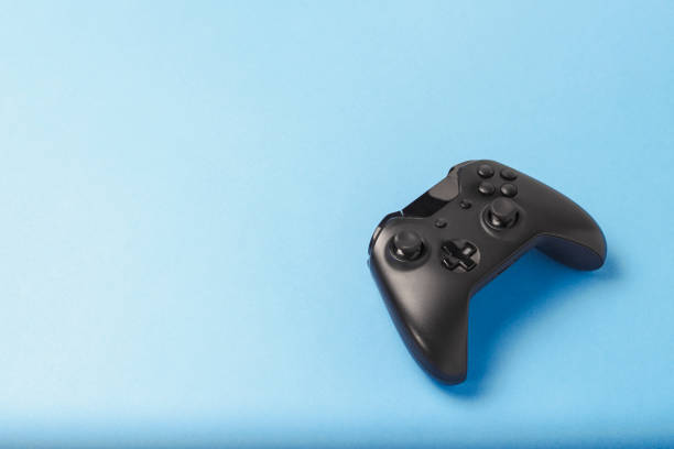 istock Gamepad on a blue background. Concept of the game in the console 1183069287