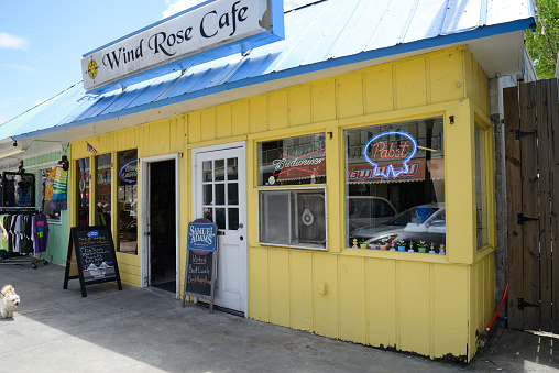 Tybee Island, Savannah, Georgia, USA - May/09/2015: main street with cafe and stores