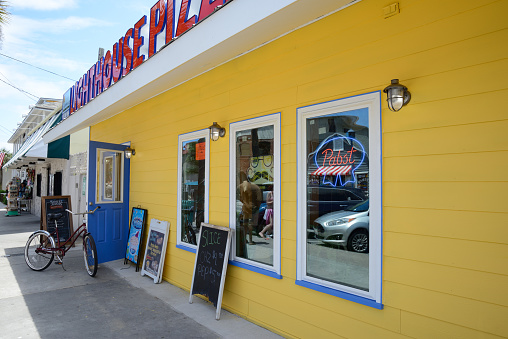 Tybee Island, Savannah, Georgia, USA - May/09/2015: main street with restaurant and stores