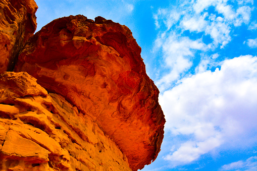 walking, riding a camel, taking pictures in Jordan, in the amazing wadi rum desert