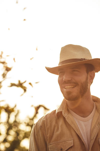 istock Portrait of a man in a straw hat 1183073156