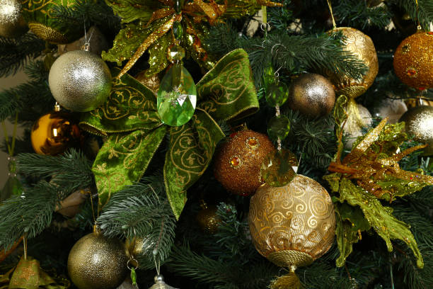 istock Close up Christmas tree decorations hanging 1183075170
