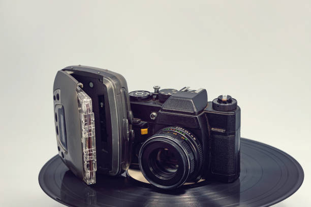 istock Technology before the digital age: cassette player, audio cassette, film camera and vinyl record 1183075962