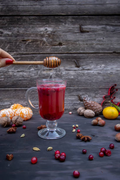 istock lingonberry juice with honey, cinnamon and anise 1183075978
