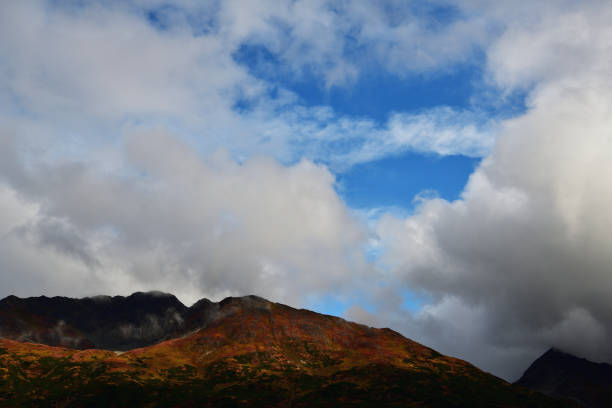 Fall colors mountain and sky in Alaska