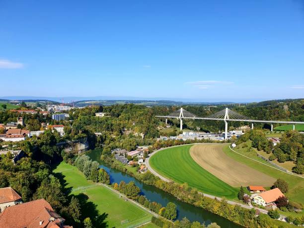 Fribourg with bridge Fribourg in Switzerland with bridge over the valley. The image was captured from the top of the church tower. fribourg city switzerland stock pictures, royalty-free photos & images