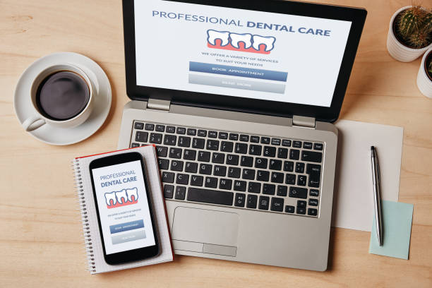 istock Dental care concept on laptop and smartphone screen 1183078496