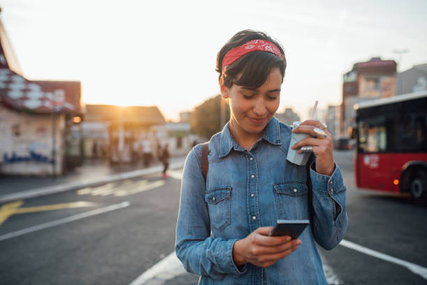 istock Young woman calling for a cab 1183079389