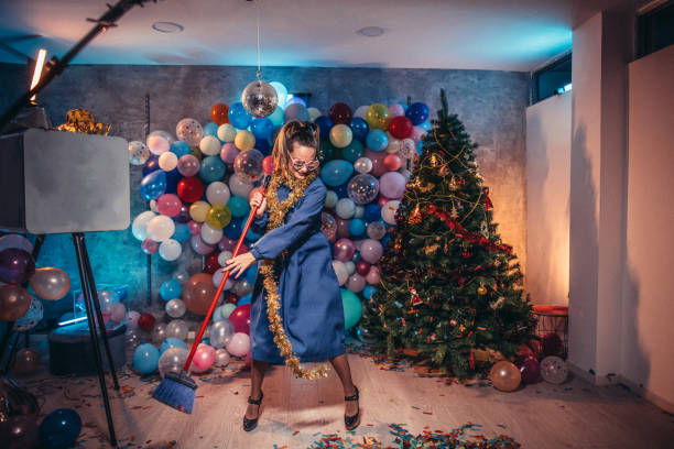 istock Lady cleaning mess after new year's party 1183082950