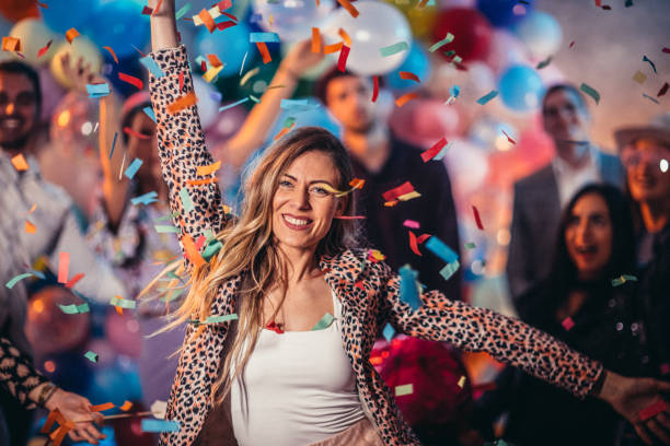 istock Lady dancing at new year's eve party 1183083525