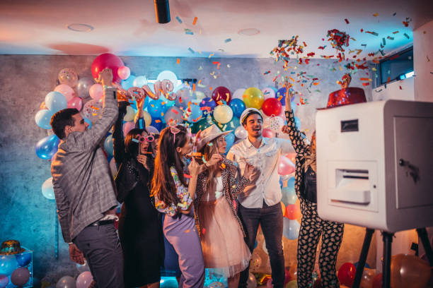 istock People dancing at new year's eve party 1183083878