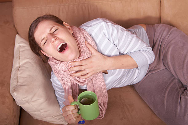 Sick young woman stock photo
