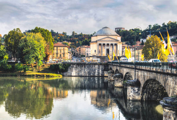 istock Ancient Bridge in Turin and the River Po 1183085636