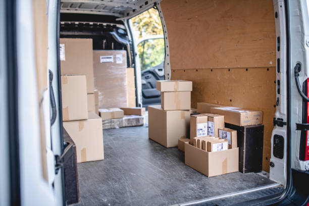istock Independent Delivery Van Partially Loaded with Parcels 1183087606