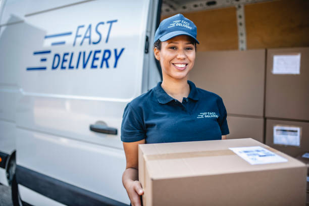 istock Millennial Generation Woman Doing Deliveries on Weekends 1183087735