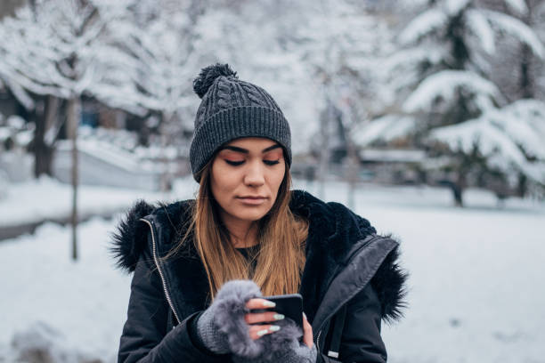 istock Young girl texting at the park 1183091368