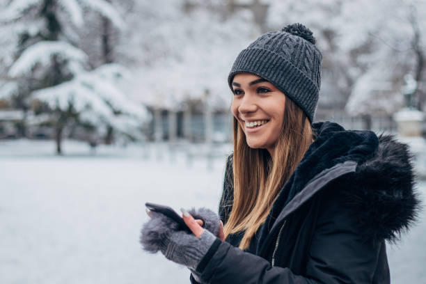 istock Young girl texting at the park 1183091437