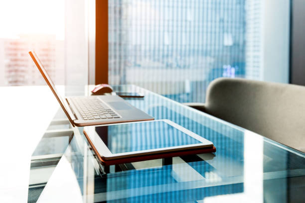 istock Laptop and digital tablet on table 1183092560