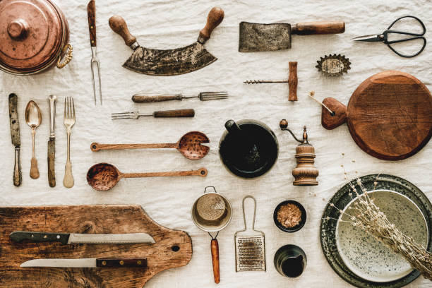 istock Various kitchen utensils and tablewear over rustic linen tablecloth 1183093104
