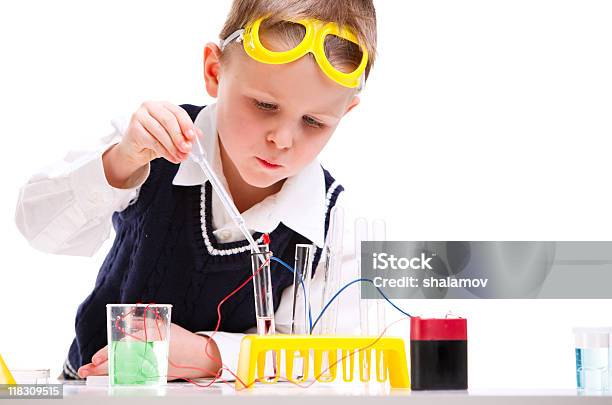 A Little Boy Playing With A Science Kit Stock Photo - Download Image Now - Boys, Chemistry, Chemistry Class