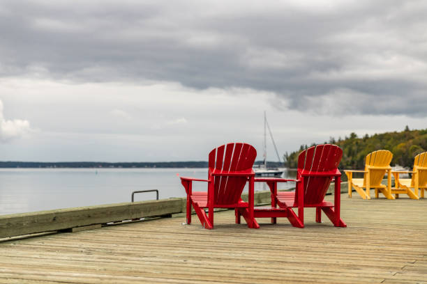 istock Deckchairs on a public jetty in Lunenburg, Canada 1183096460