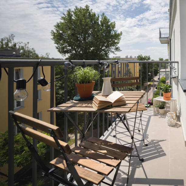 istock Wooden table on a balcony 1183097098