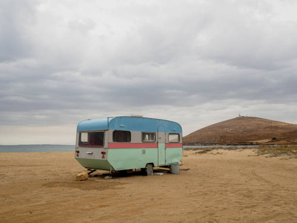 istock Retro caravan near the sea 1183103514
