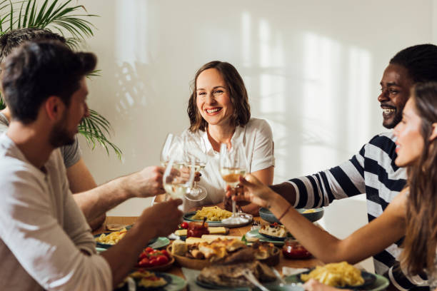 istock Friends Enjoying Dinner Party 1183106156