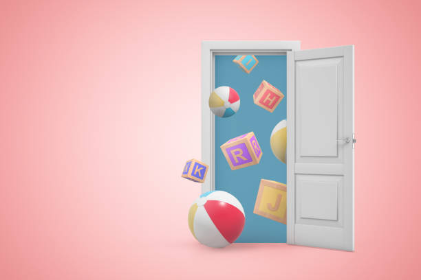 istock 3d rendering of open white door on gradient pink background and many windballs and ABC blocks flying from doorway. 1183106328