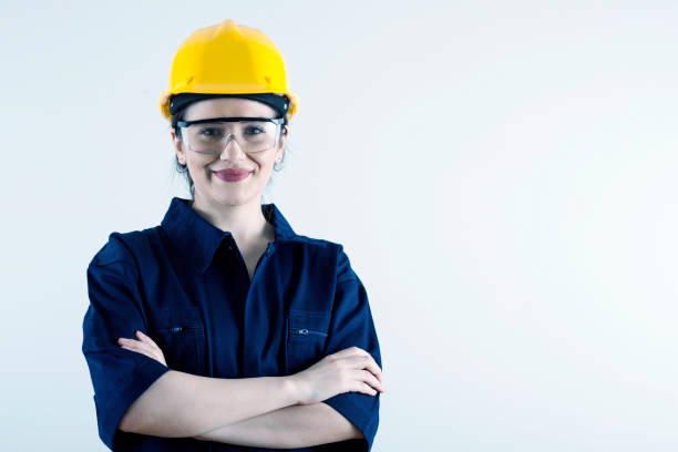 istock engineer woman  in yellow helmet 1183107283