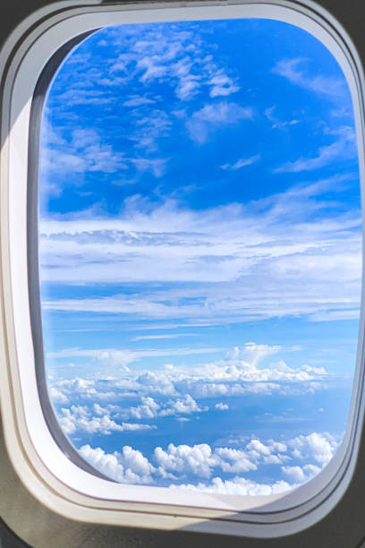 Aviation, Commercial Aircraft, In-Flight - Clear Blue Sky Seen from a Commercial Airliner Window