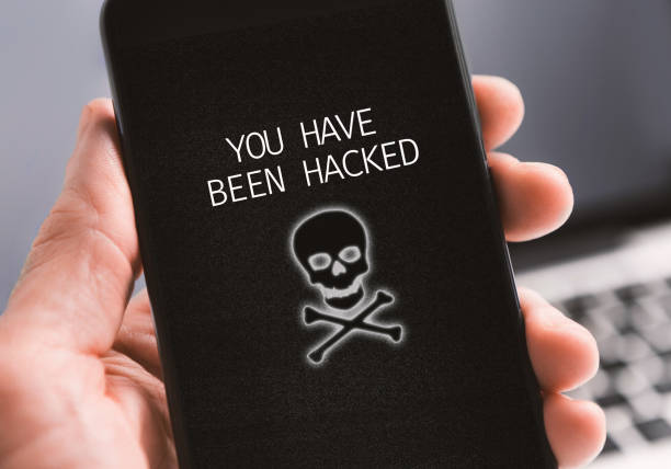 istock Modern smartphone with you have been hacked notification on screen 1183112051