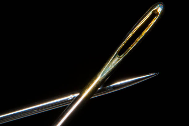 istock Macro shots sewing needles close-up picture 1183114227