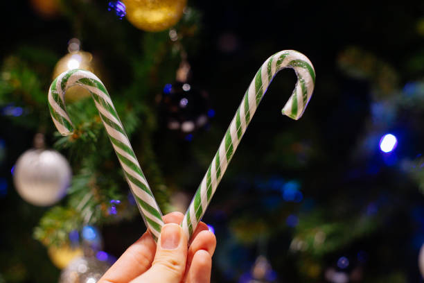 istock Decorated Christmas tree on blurred, sparkling background 1183114483