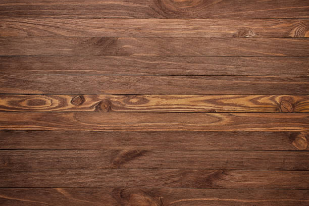 istock Wooden background with copyspace, brown striped timber desk, old table or floor 1183115529