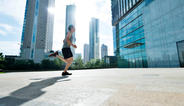 istock Man running in city street 1183115856