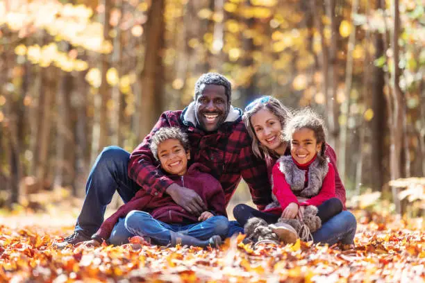Mixed race family portrait, during autumn, Quebec, Canada