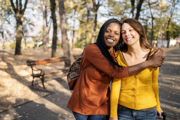 istock Multi ethnic friends tourists with luggage 1183119210