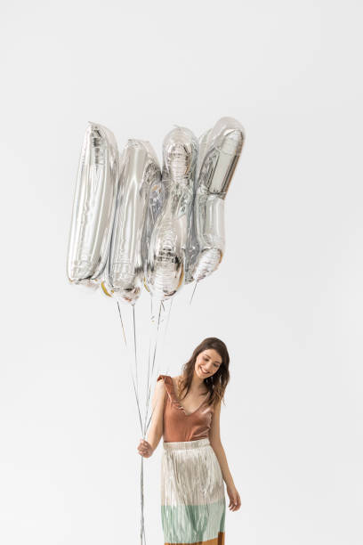 istock Beautiful Woman Celebrating Christmas 1183120075